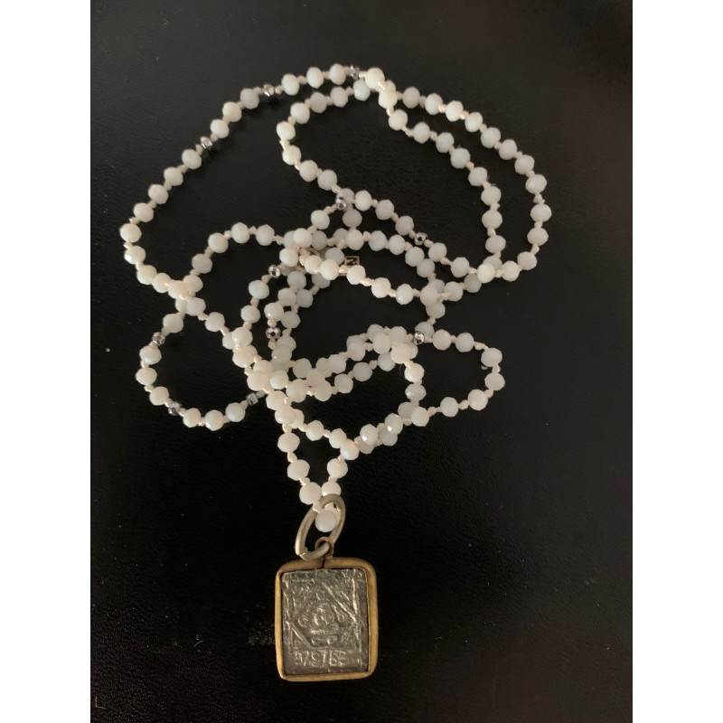 Ketting  amulet zilver met gouden rand.